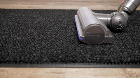 Carpeted Indoor Entrance Mat 3 Ft By 4 Ft Charcoal For Home Or Biz Durable Floor Protector That Traps Dirt And Moisture Easy To Vacuum Low Profile With Vinyl Backing Keeps It Secure with vacuum on mat.