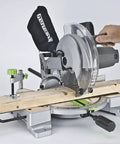 Beefy 15 Amp 10 Inch Compound Miter Saw With Laser Guide And Nine Positive Miter Stops cutting wood with precision on the job site
