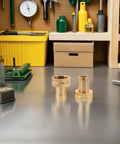 Get Your Garden Hose Back On Track With This Awesome Brass Repair Connector Set Featuring Stainless Steel Clamps And Easy Male Female Hose Coupling Kit For Quick Fixes Without The Hassle. Brass hose repair fittings on workbench, male and female connectors