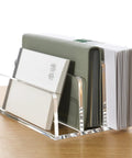 Clear Acrylic 3 Compartment Mail Holder And Desk Organizer for bills, documents, and notebooks; side view on a desk.