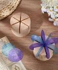 Two Piece Pine Wood Mini Glass Spinner Jigs Set Pro Grade With 60 Degree And 45 Degree Glass Angles For Soldering Glass Art Crafting And DIY Projects shown on a wooden surface with colorful glass pieces, displaying sturdy pine wood construction.