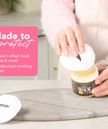 Soapstone and Concrete Countertop Wax 6 oz Orange Lemon Scent with Carnauba and Beeswax That Builds a Non Greasy Protective Barrier Against Stains and Spills on Stone Slate Concrete and Butcher Block Surfaces jar on concrete countertop