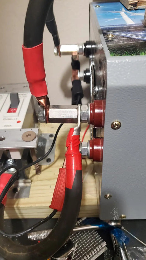Close-up of electrical connections using Real Deal Five Pcs M8 Hex Coupling Nuts Featuring 1.25 Metric Thread Pitch and Compact 24MM Length.