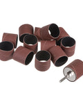 Twelve Pcs 1-1/2 Inch Sanding Sleeves Kit 120 Grit With 1/4 Inch Drum Mandrels For Rotary Tools, shown laid out with one mandrel attached.