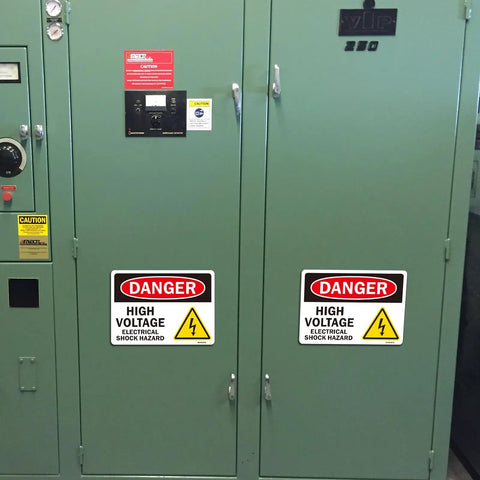 Heavy Duty Danger High Voltage Warning Signs Five Pack Tough As Nails Weatherproof Electrical Shock Hazard Decals on green cabinet.