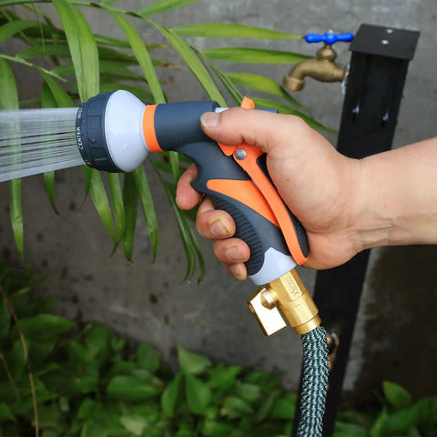 Hand using Expandable Telescopic Garden Hose End Adapter With Shut Off Valve And Repair Kit Fits Three Quarter Inch GHT