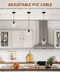 Matte Black Pendant Light For Kitchen Island With E26 Base And Adjustable Cable, Glass Cylinder Shade in bright kitchen space