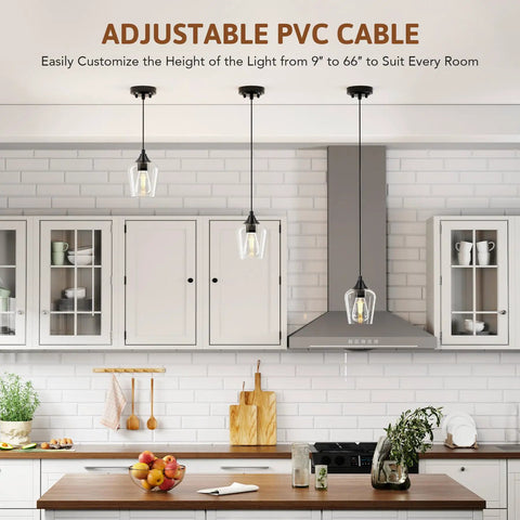 Matte Black Pendant Light For Kitchen Island With E26 Base And Adjustable Cable, Glass Cylinder Shade in bright kitchen space