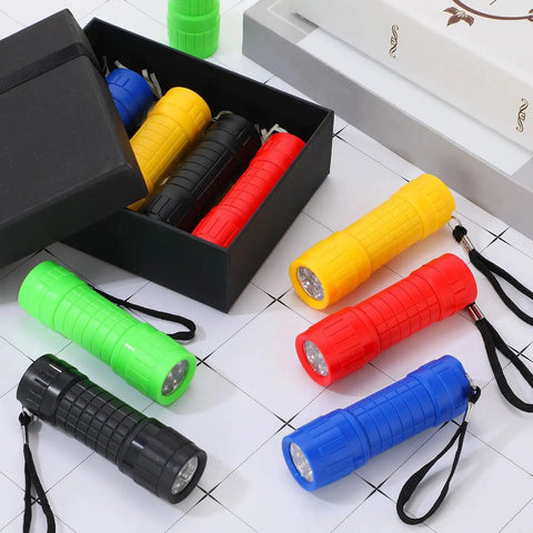 60 Pack 9 LED Handy Mini Flashlights With Lanyards AAA Batteries Included Bulk Set For Home School Night Reading Emergencies Gifts Fresh Colors Kid Safe Plastic Lights displayed with box