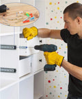 Man using drill with Repair And Wall Hanging Kit 600 Piece Assortment With Screws Nails Drywall Anchors Picture Hangers Cup Hooks