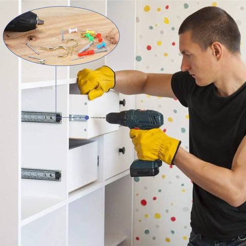 Man using drill with Repair And Wall Hanging Kit 600 Piece Assortment With Screws Nails Drywall Anchors Picture Hangers Cup Hooks
