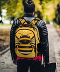 Golden Bloom Bumblebee Printed Unisex Backpack With Large Capacity For School And Travel Durable Polyester Build Breathable Design Smooth Zipper Go To Everyday Carryall shown outdoors.