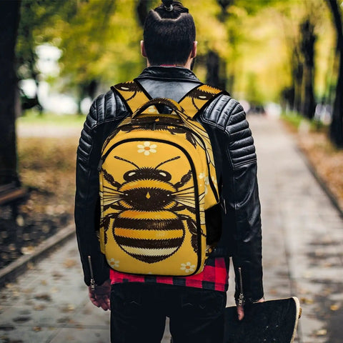 Golden Bloom Bumblebee Printed Unisex Backpack With Large Capacity For School And Travel Durable Polyester Build Breathable Design Smooth Zipper Go To Everyday Carryall shown outdoors.