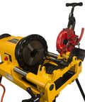 Steel Dragon Tools 300 Compact Pipe Threader Machine With Self Opening Die Head And Two Dies for cutting and threading pipes.