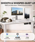 WankaMom Electric Standing Desk With Smooth Silent Lift And 154 Lbs Load Capacity, Premium Carbon Steel Frame with monitors and cat.