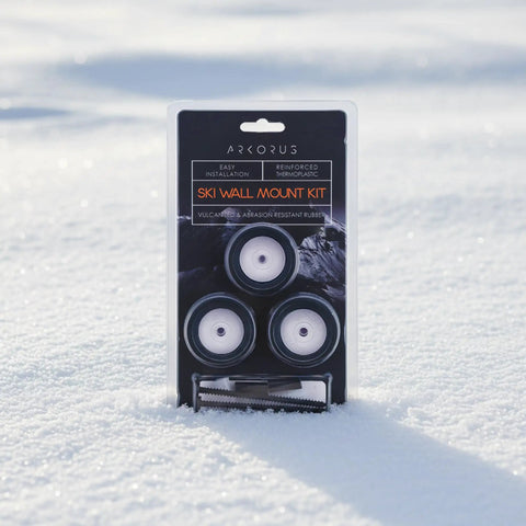 Super Sleek Ski Wall Mount Rack Keeps Your Skis Tight And Scratch Free With Hybrid Edge Guard Tech packed in a snow setting.
