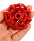 Person holding Red Shutoff Valve Handwheel Replacement Handles For Gate Valves Half Inch Metal Faucet Wheel Handle Kit For Outdoor Spigot Repair