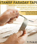 Hands holding TitanRF Faraday Shield Tape 2.5 Inch Wide By 10 Feet Long Heavy Duty Conductive Adhesive Tape For EMI And RF Shielding