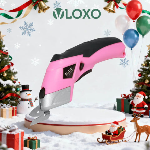 Cordless Electric Scissors For Cardboard And Fabric With Two Blade Types, pink, on festive platform with decorations