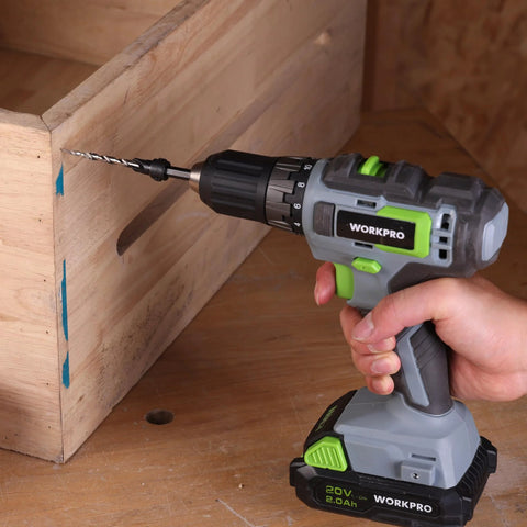 Side view of a WORKPRO cordless drill fitted with a countersink bit drilling into wood.