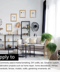 Modern living room with minimalist decor, light sofa, layered shelving, decorative plants, and framed wall art for design inspiration.