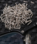 1200 Piece Miniature Self Tapping Screw Set Featuring Crosshead Drive And Rugged Carbon Steel Build For Diy Repairs And Furniture Assembly on black background.