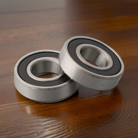 Thin Section 10x22x6mm Sealed Deep Groove Ball Bearing Set For Cycling Hub Front Replacement Parts Lightweight Stainless Steel Bearings For Bike Repair Kits 6900-2RS Style Fit Durable And Easy To Install, two sealed bearings on wood