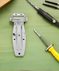Beefy Stainless Steel Side Door Hinge For Box Trucks And Cargo Containers High Load Capacity Smooth Operation Rugged Metal Hinge Built For Long Haul And Marine Use on workbench