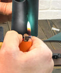 MYOYAY ESD rubber soldering mat large roll, anti-static ground protection, black, close-up with lighter flame