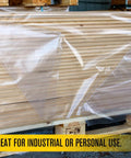 Clear All Purpose Poly Sheeting Roll Heavy Duty 4 Mil Extra Strong Tear Resistant Plastic Sheeting 20 Feet By 100 Feet For Construction Painting Tarping And Pro Grade Jobsite Protection covering wooden boards on a pallet.