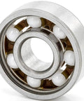 Top Shelf 608 Open Style Deep Groove Radial Ceramic Ball Bearings Bulk Pack Of One Hundred Silicon Nitride Rings Measuring 8 By 22 By 7 Mm close-up view showing ceramic balls.