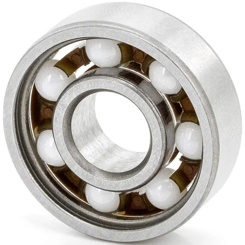 Top Shelf 608 Open Style Deep Groove Radial Ceramic Ball Bearings Bulk Pack Of One Hundred Silicon Nitride Rings Measuring 8 By 22 By 7 Mm close-up view showing ceramic balls.