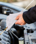 Person using White 100 Percent Cotton Shop Towels 500 Count Heavy Duty Commercial Industrial B Grade 14 By 15 Inches on car engine