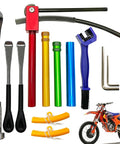 All In One Dirt Bike Tire Change Kit For 16 To 21 Inch Wheels With 15mm 17mm 20mm 25mm Axle Shafts Two 11 Inch Tire Irons A 16 Inch Tire Iron Rim Protectors And Chain Brush Emergency Response Gear with tire irons, axle shafts, rim protectors, and a dirt bike.