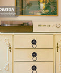 Vintage wardrobe with brass single hole drawer pull handle for cabinets and doors, retro rustic furniture hardware shown installed.