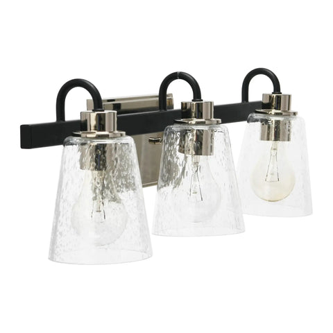Three Light Vanity Fixture With Seeded Glass Diffusers Matte Black Finish With Polished Nickel Accents Sleek Industrial Vibe