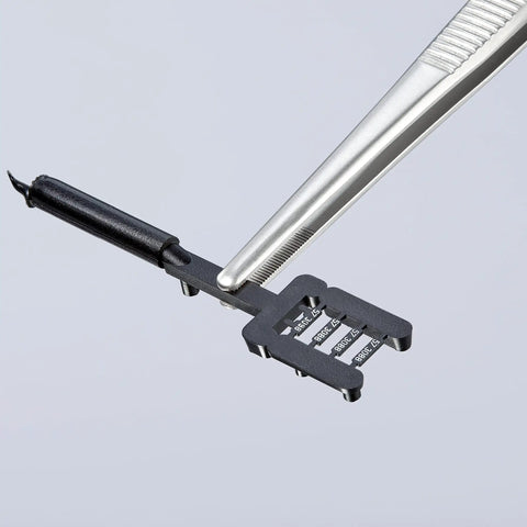 Precision Tweezers With Approx 30 mm Round Tips And Fine Serration, Nickel Plated Chrome Finish holding small electronic component