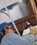 Electrician using 9 Inch High Leverage Linesman Pliers For Copper Aluminum And Soft Metals, Durable Made In USA Build, Heavy Duty Hand Tool.