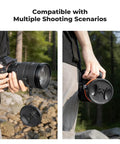 67mm Front Lens Cap Kit With Center-Pinch Design, camera held outdoors with anti-loss keeper in use