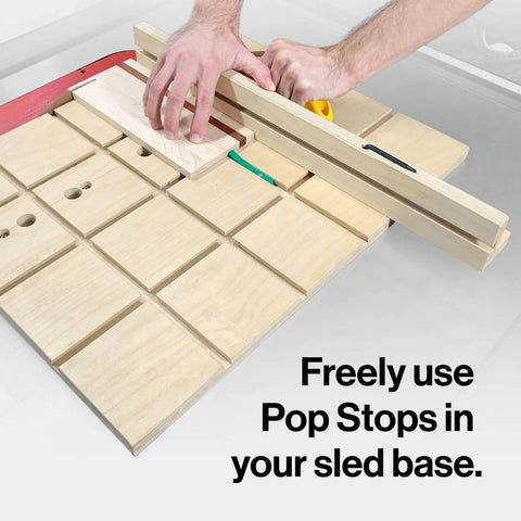 MicroJig MatchFit Pop Stop 6-Pack: Pro Go-To Dovetail Track Stops for versatile woodworking on a sled, close-up view