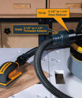 Two And A Half To One And A Quarter Inch Dust Hose Reducer for Dust Collection Systems connected to a vacuum and sander.