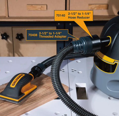 Two And A Half To One And A Quarter Inch Dust Hose Reducer for Dust Collection Systems connected to a vacuum and sander.