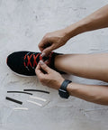Check out this Sick 78pcs Heat Shrink Shoelace Ends Repair Kit With Plastic Caps For Casual And Formal Shoes To Fix Tips Fast And Save Your Laces Anytime Anywhere, hands fitting lace ends on sneaker