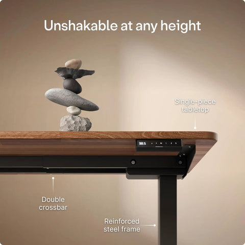 Built Tough Electric Standing Desk With Heavy Duty Dual Motors And Super Smooth Height Adjustments, showing sturdy walnut top and steel frame.