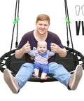 Man and baby sitting on Black Round Saucer Swing With Handles For Backyard Fun, Built Tough Steel Frame, 40 Inch Diameter