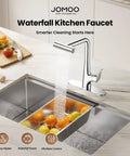 JOMOO Waterfall Pull Down Kitchen Faucet in chrome pouring water over fruits in a stainless steel sink.