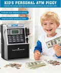 Boy using Rechargeable Kids ATM Bank With Real Money Safe Debit Card Access Coin Recognition Bill Feeder Balance Calculator