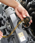 Two-pack Amazon fluid transfer pumps with amber tubing; hand installing into engine bay reservoir