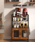 Rustic Brown Coffee Bar Cart on Wheels, 3 Tier Coffee Station Table With Pull Out Wire Basket Drawer, styled with coffee makers.