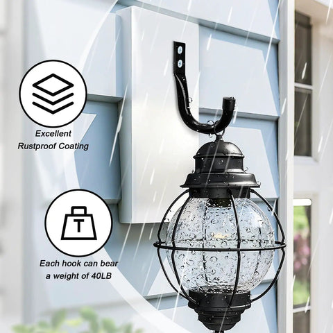 Beefy Heavy Duty Metal Wall Hook mounted outdoors holding a lantern, highlighting rust-resistant coating, suitable for up to 40LB.